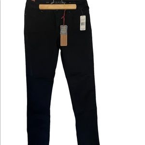 Women’s black skinny jeans, NWT.